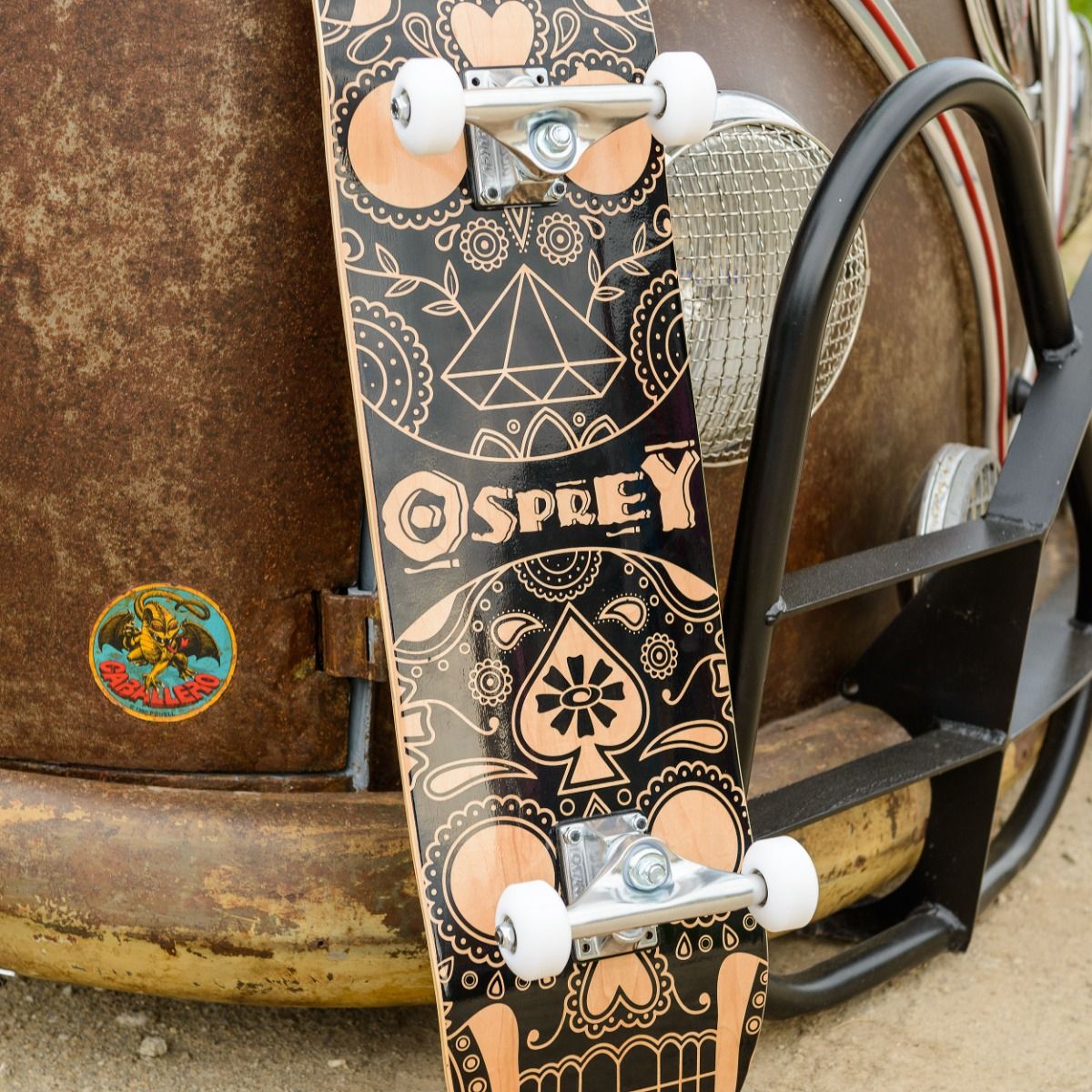 OSPREY 8" X 31" COMPLETE DOUBLE KICK SKATEBOARD- CANDY SKULL